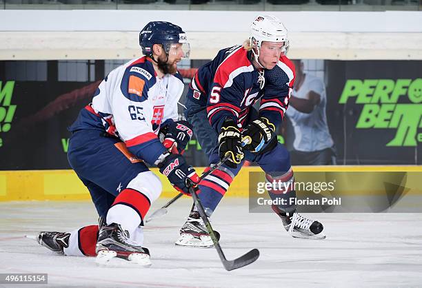 Tomas Marcinko of Team Slovakia and Sam Lofquist of Team USA during the game between USA and the Slovakia on November 6, 2015 in Augsburg, Germany.