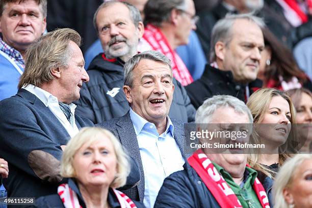 President Harald Strutz of Mainz , DFB President Wolfgang Niersbach and Marion Popp attend the Bundesliga match between 1. FSV Mainz 05 and VfL...