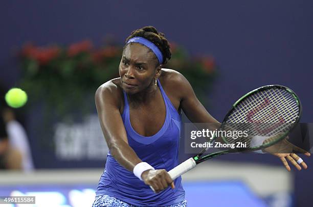 Venus Williams of USA returns a shot during the match against Roberta Vinci of Italy on day 6 of Huajin Securities WTA Elite Trophy Zhuhai at Hengqin...