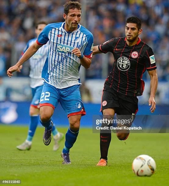 Kevin Kuranyi of Hoffenheim is challenged by Carlos Zambrano of Frankfurt during the Bundesliga match between 1899 Hoffenheim and Eintracht Frankfurt...