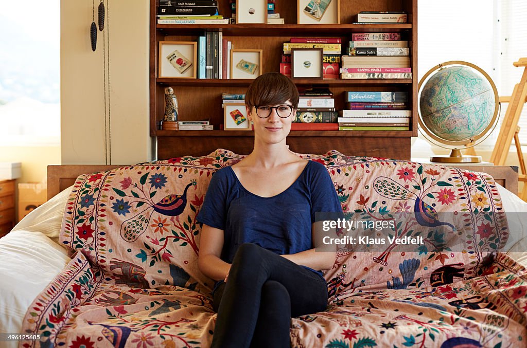 Portrait of female painter working from home