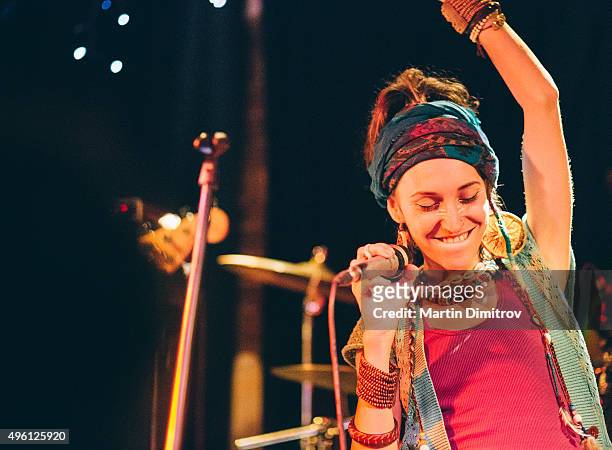 singer on the stage - rock musician stock pictures, royalty-free photos & images