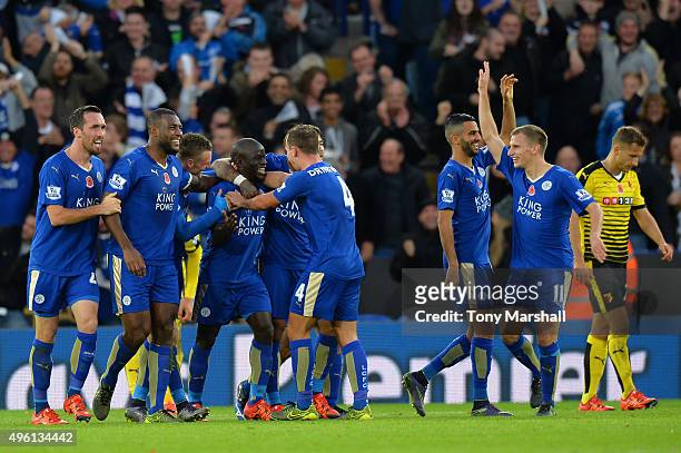 Ngolo Kante of Leicester City celebrates scoring his team's first goal with his team mates during the Barclays Premier League match between Leicester...