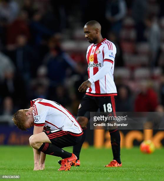 Sunderland player Duncan Watmore and Jermain Defoe react on the final whistle after the Barclays Premier League match between Sunderland and...