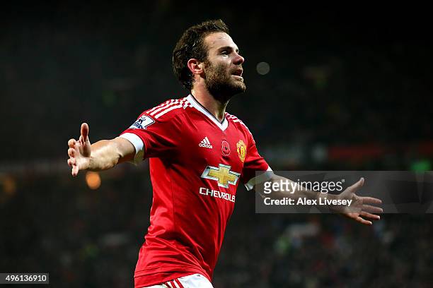 Juan Mata of Manchester United celebrates scoring his team's second goal during the Barclays Premier League match between Manchester United and West...