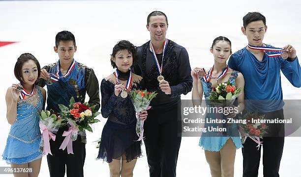 Second place winner Wending Sui and Cong Han of China, First place winner Yuko Kavaguti and Alexander Smirnov of Russia and Third place winner Xiaoyu...