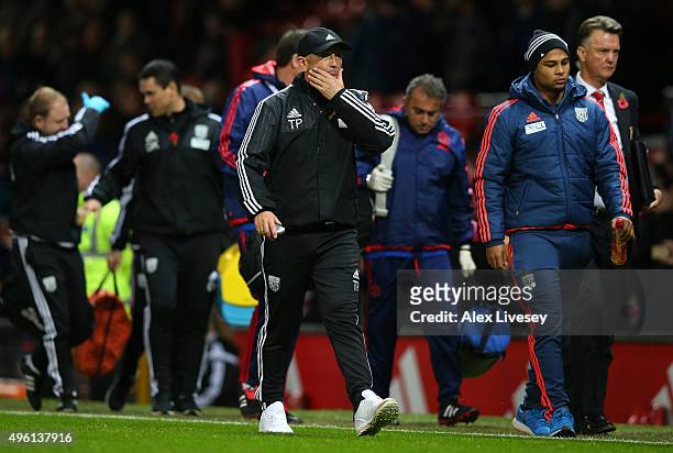 Tony Pulis manager of West Bromwich Albion leaves the pitch after his team's 0-2 defeat in the Barclays Premier League match between Manchester...