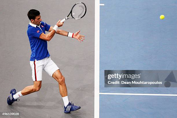 Novak Djokovic of Serbia in action against Stan Wawrinka of Switzerland in their semi final match during Day 6 of the BNP Paribas Masters held at...