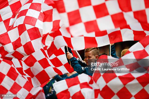 Stoke City supporters wave flags prior to the Barclays Premier League match between Stoke City and Chelsea at Britannia Stadium on November 7, 2015...