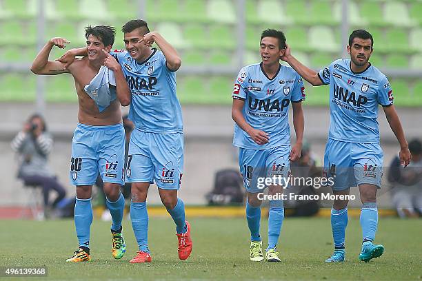 Ignacio Herrera of Deportes Iquique celebrates with teammates after scoring the fifth goal of his team during a match between Deportes Iquique and U...