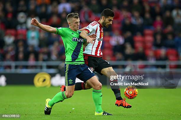 Jordi Gomez of Sunderland and James Ward-Prowse of Southampton compete for the ball during the Barclays Premier League match between Sunderland and...