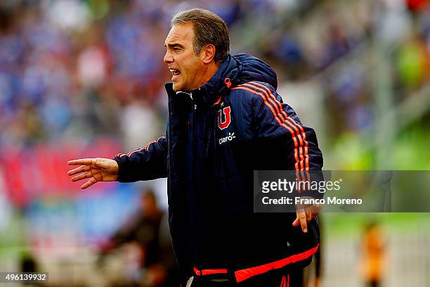 Martin Lasarte head coach of U de Chile shouts instructions to his players during a match between Deportes Iquque and U de Chile as part of 12 round...