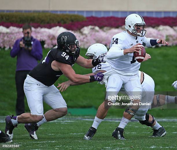 Dean Lowry of the Northwestern Wildcats sacks Christian Hackenberg of the Penn State Nittany Lions at Ryan Field on November 7, 2015 in Evanston,...