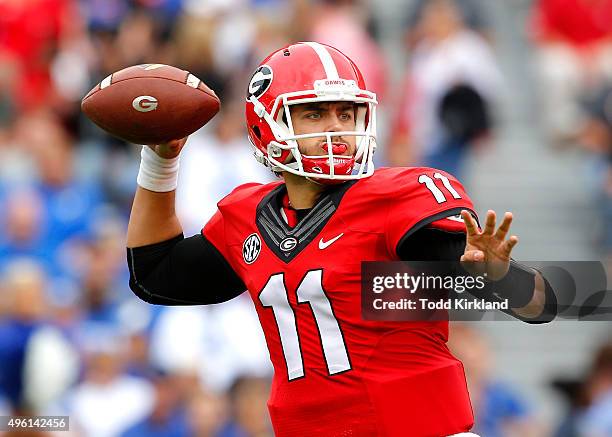 Greyson Lambert of the Georgia Bulldogs drops back to pass in the first quarter of the game against the Kentucky Wildcats on November 7, 2015 at...