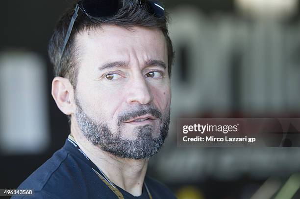 Max Biaggi of Italy looks on in paddock during the qualifying practice during the MotoGP of Valencia - Qualifying at Ricardo Tormo Circuit on...