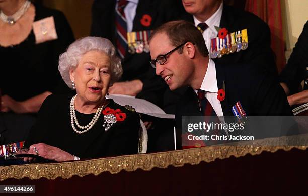 Queen Elizabeth II and Prince William, Duke of Cambridge chat to each other in the Royal Box at the Royal Albert Hall during the Annual Festival of...