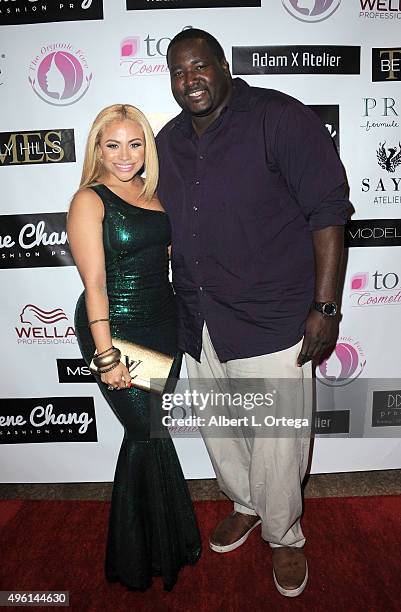 Singer Charisse Mills and actor Quentin Aaron attend "Reel Haute" In Hollywood International Couture Fashion Show held at The Beverly Hilton Hotel on...