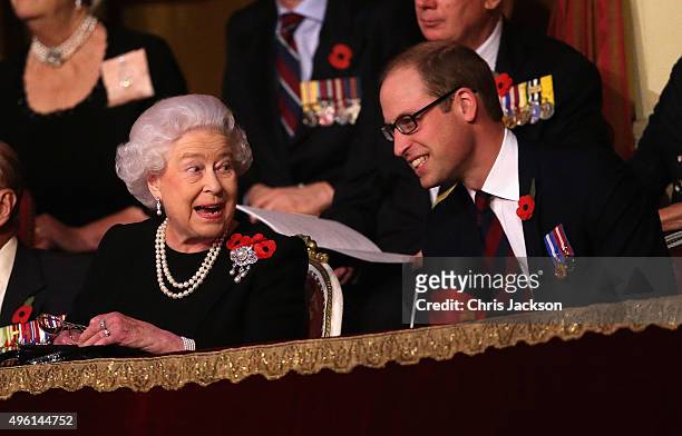 Queen Elizabeth II and Prince William, Duke of Cambridge chat to each other in the Royal Box at the Royal Albert Hall during the Annual Festival of...