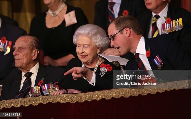 Queen Elizabeth II and Prince William, Duke of Cambridge chat to each other as Prince Philip, Duke of Edinburgh looks on in the Royal Box at the...