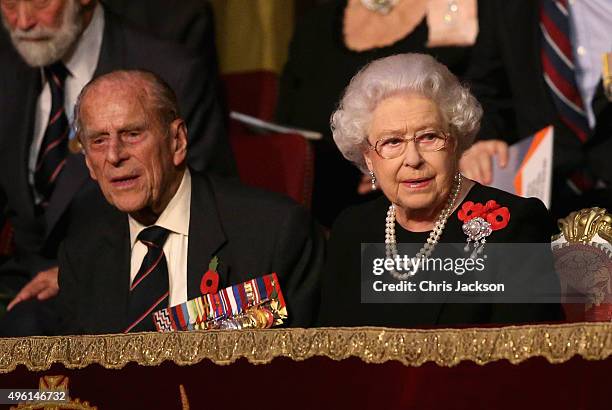 Queen Elizabeth II and Prince Philip, Duke of Edinburgh in the Royal Box at the Royal Albert Hall during the Annual Festival of Remembrance on...