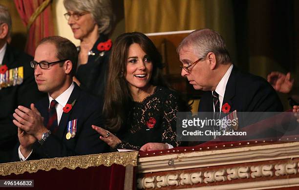 Catherine, Duchess of Cambridge, Prince William, Duke of Cambridge and Prince Andrew, Duke of York chat at the Royal Albert Hall for the Annual...