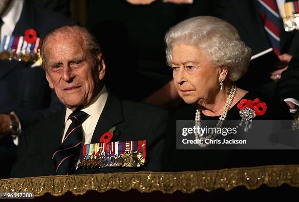 Queen Elizabeth II and Prince Philip, Duke of Edinburgh in the Royal Box at the Royal Albert Hall during the Annual Festival of Remembrance on...