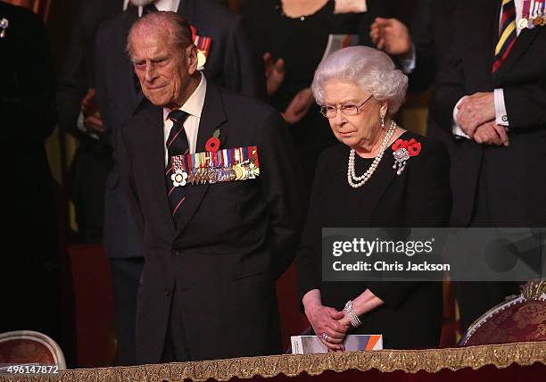 Queen Elizabeth II and Prince Philip, Duke of Edinburgh in the Royal Box at the Royal Albert Hall during the Annual Festival of Remembrance on...