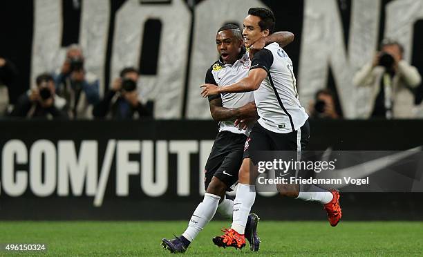 Jadson of Corinthians celebrates scoring the first goal with Malcom during the match between Corinthians and Coritiba for the Brazilian Series A 2015...