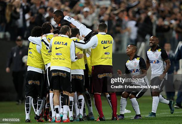 Jadson of Corinthians celebrates scoring the first goal with his team during the match between Corinthians and Coritiba for the Brazilian Series A...