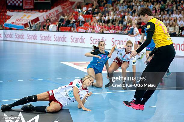 Gro Hammerseng-Edin watch as 12 Sergeja Stefanisin saves the shot in the match between Larvik HK and RK Krim Mercator on November 7, 2015 in Larvik,...