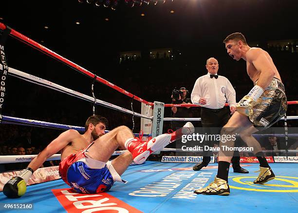 Callum Smith knocks down Rocky Fielding for the first time during their Super Middleweight contest at the Echo Arena on November 7, 2015 in...