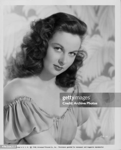 Posed studio portrait of actress Susan Hayward, with Universal Pictures, 1948.
