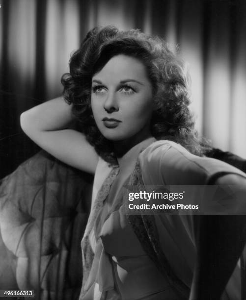 Promotional portrait of actress Susan Hayward, wearing a sheer negligee, for the movie 'Tulsa', 1949.