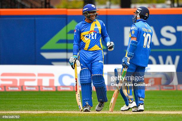 Sachin's Blasters player Sachin Tendulkar speaks to teammate Virender Sehwag during a match in the Cricket All-Stars Series at Citi Field on November...