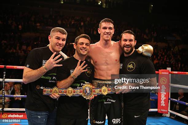 Callum Smith stands alongside brothers Liam, Stephen and Paul Smith, after beating Rocky Fielding during their Super Middleweight contest at the Echo...