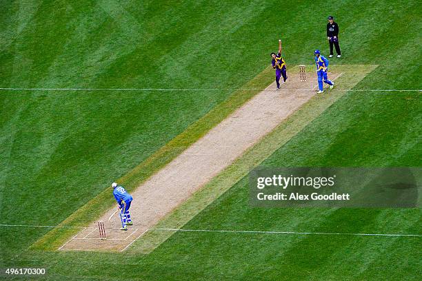 Warne's Warriors player Wasim Akram bowls to a Sachin's Blasters player during a match in the Cricket All-Stars Series at Citi Field on November 7,...