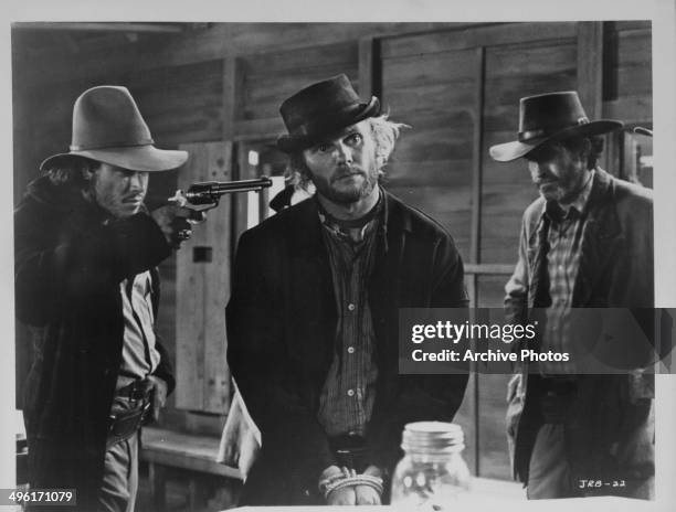 Actors Tab Hunter and Paul Newman in a scene from the movie 'The Life and Times of Judge Roy Bean', 1972.