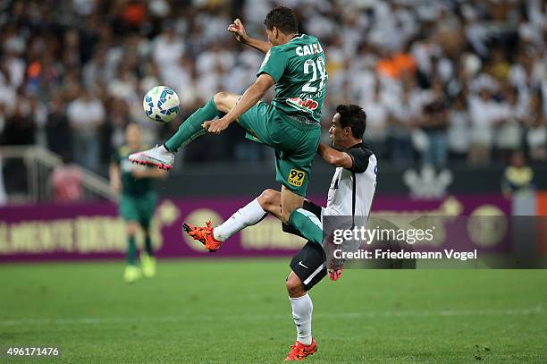 Jadson of Corinthians fights for the ball with Juninho of Coritiba during the match between Corinthians and Coritiba for the Brazilian Series A 2015...