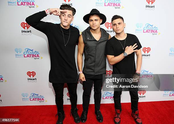 Nesty Galguera, Leo Herrera and Monti Montanez of Grupo Treo attend iHeartRadio Fiesta Latina presented by Sprint at American Airlines Arena on...