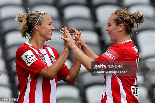 Aivi Luik and Marianna Tabain of Melbourne City celebrate a goal during the round four W-League match between Canberra United and Melbourne City FC...