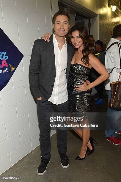 Actors Eric Winter and Roselyn Sanchez attend iHeartRadio Fiesta Latina presented by Sprint at American Airlines Arena on November 7, 2015 in Miami,...