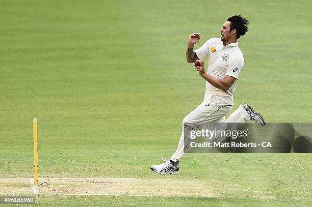 Mitchell Johnson of Australia bowls during day four of the First Test match between Australia and New Zealand at The Gabba on November 8, 2015 in...