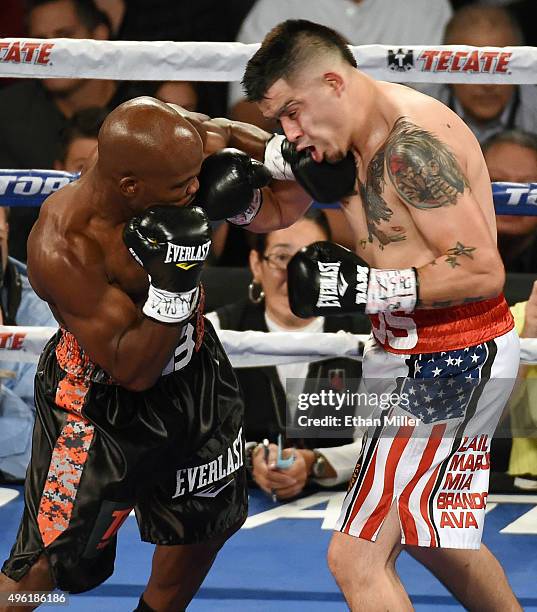 Timothy Bradley Jr. Hits Brandon Rios in the first round of their WBO welterweight title fight at the Thomas & Mack Center on November 7, 2015 in Las...