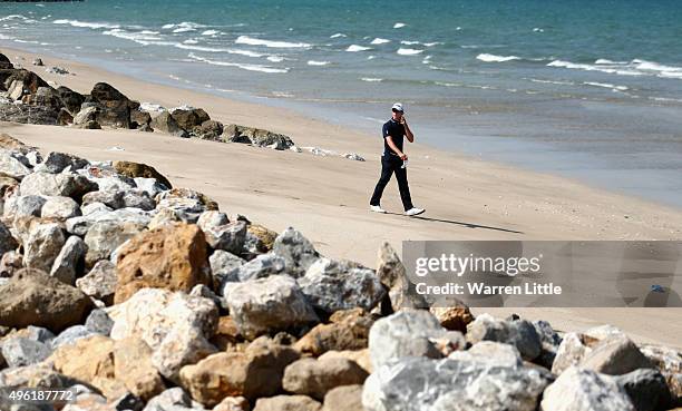 Brandon Stone of South Africa walks onto the beach to play his second shot on the 12th hole during the final round of the NBO Golf Classic Grand...