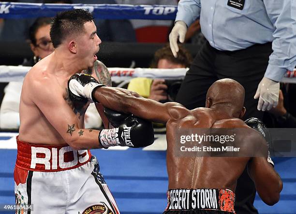 Timothy Bradley Jr. Hits Brandon Rios in the fifth round of their WBO welterweight title fight at the Thomas & Mack Center on November 7, 2015 in Las...