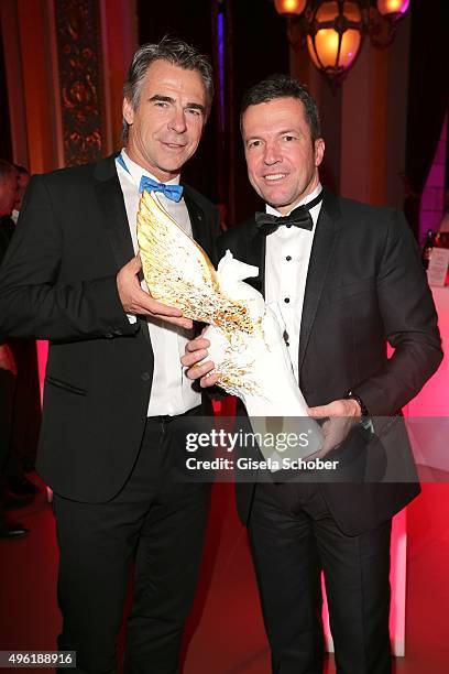 Dr. Tillmann Blaschke, CEO of Meissen and Lothar Matthaeus with Meissen Pegasos Award during the German Sports Media Ball at Alte Oper on November 7,...