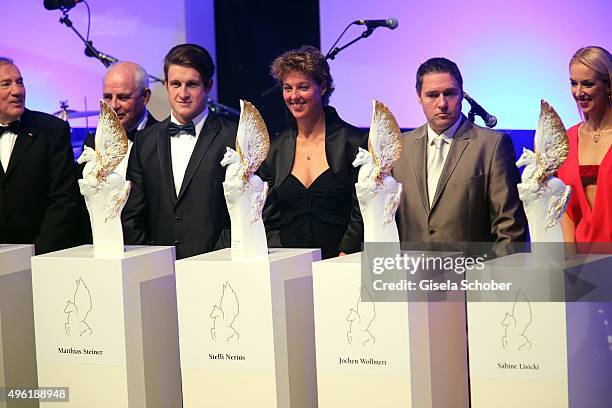 Matthias Steiner, Steffi Nerius, Jochen Wollmert, Sabine Lisicki with Meissen Pegasos Award during the German Sports Media Ball at Alte Oper on...