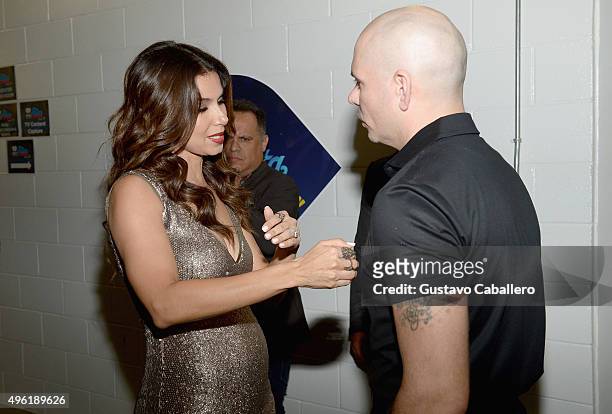 Roselyn Sanchez and Pitbull attend iHeartRadio Fiesta Latina presented by Sprint at American Airlines Arena on November 7, 2015 in Miami, Florida.