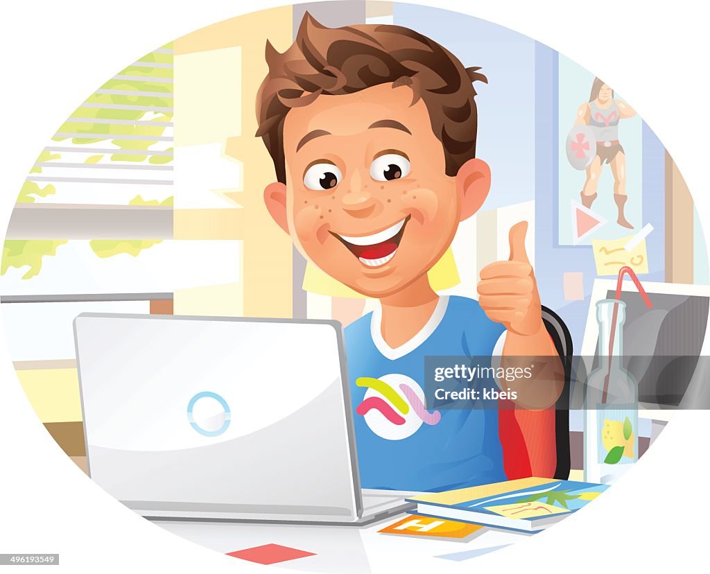 Young Boy Using Laptop