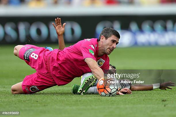 Nick Montomgery of the Mariners collides with Roy Krishna of the Phoenix during the round five A-League match between the Central Coast Mariners and...
